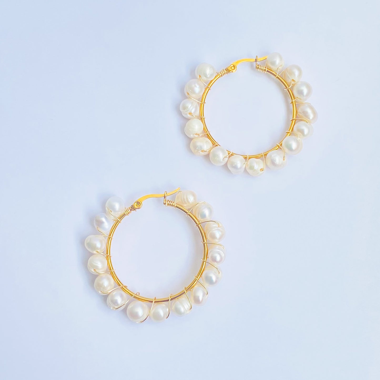 AMELIE - ARRACADAS PERLA DE RIO ACERO INOXIDABLE