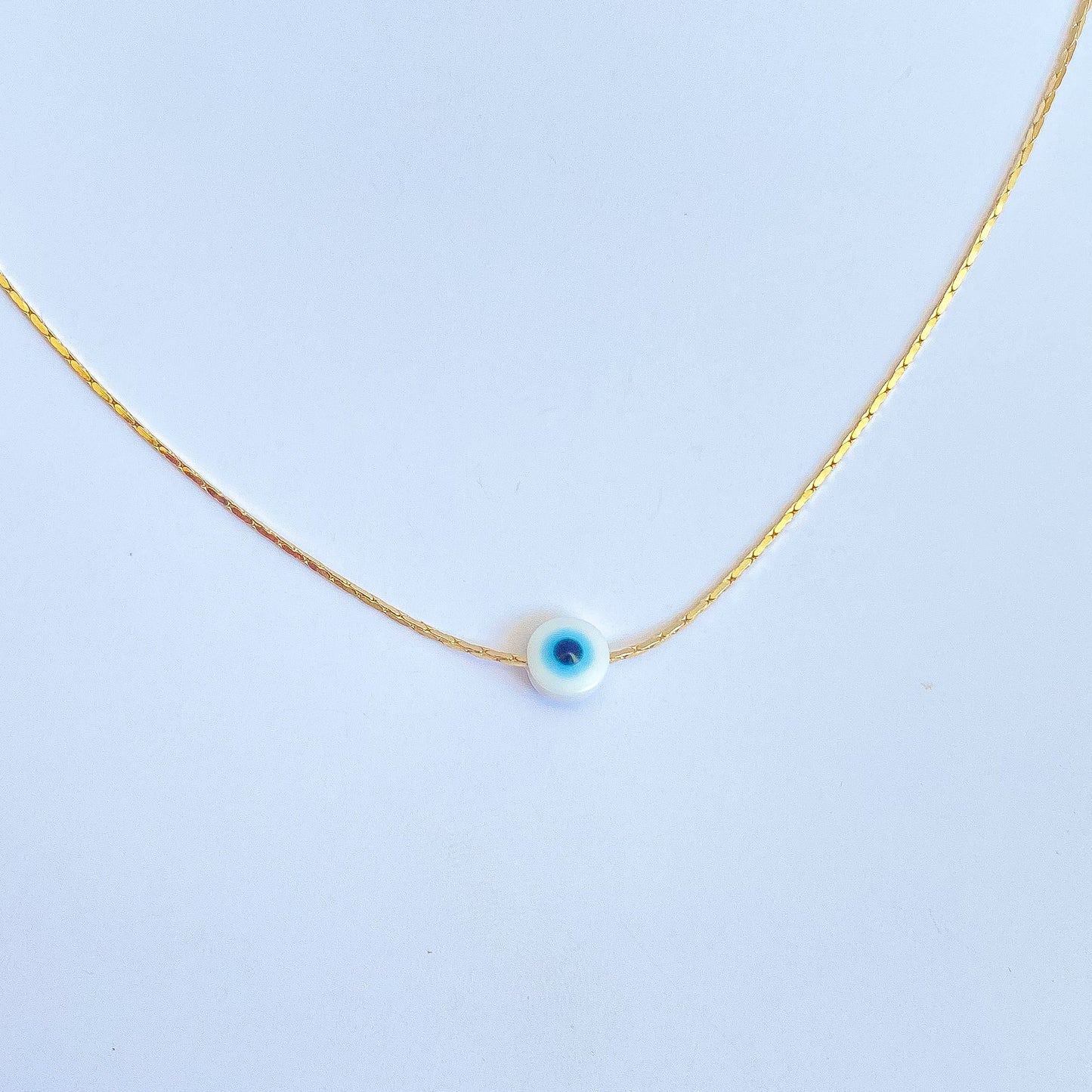 RAZI - COLLAR OJO TURCO AZUL CHAPA DE ORO