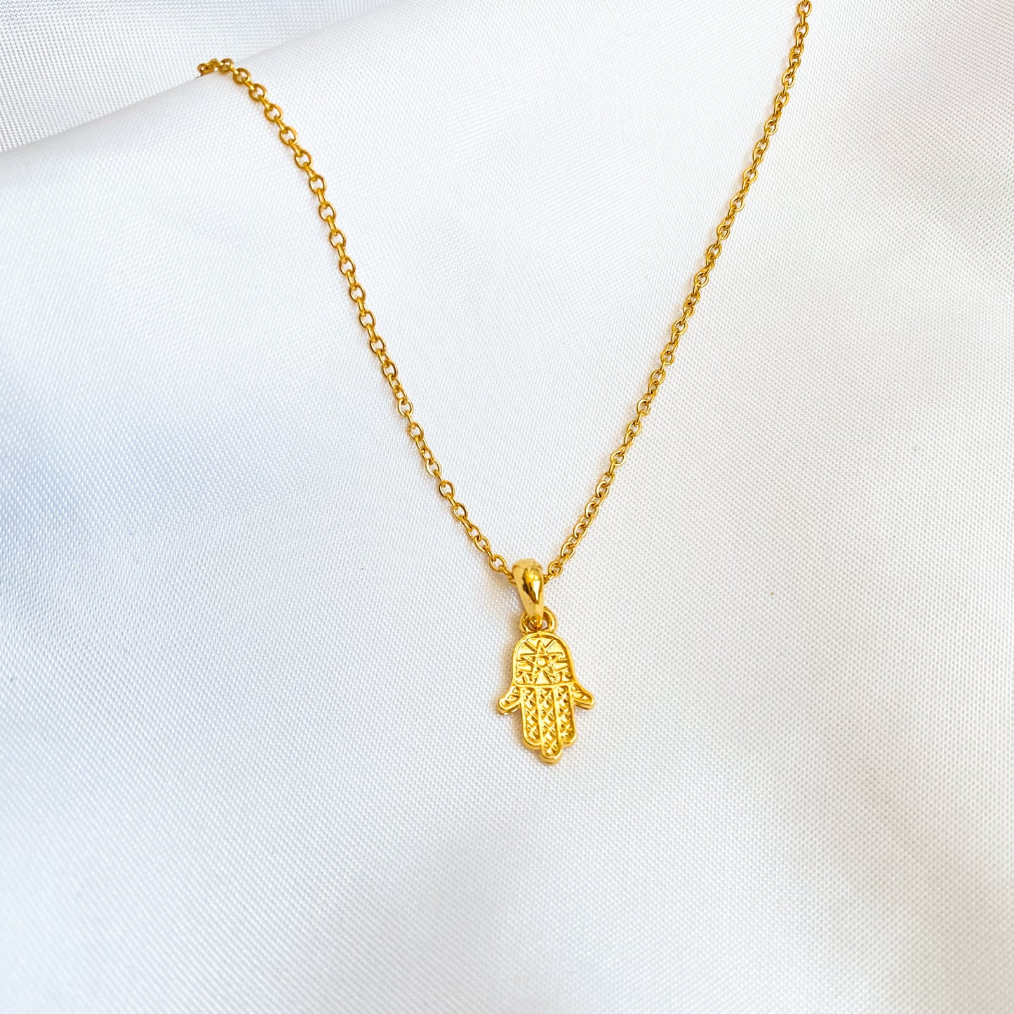 NORMA COLLAR MANO DE FATIMA CHAPA DE ORO