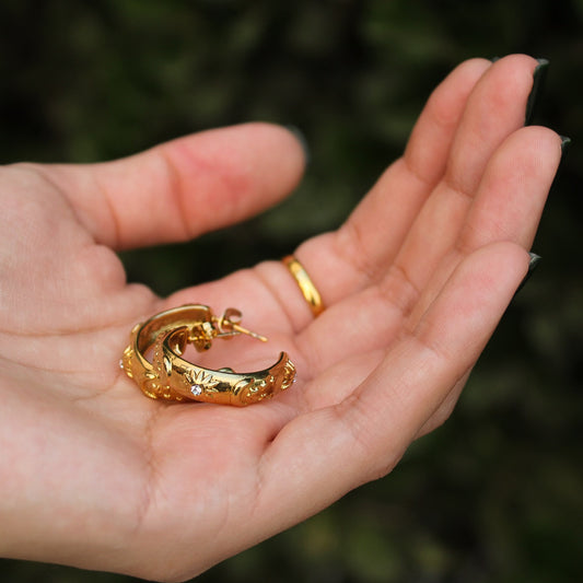 MELODY - ARRACADA ASTROS ACERO INOXIDABLE