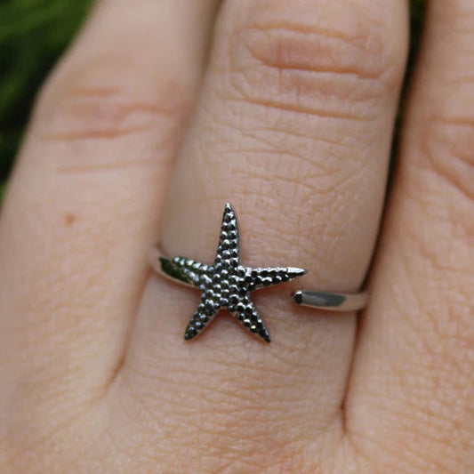 MELLY- ANILLO AJUSTABLE ESTRELLA DE MAR ACERO INOXIDABLE