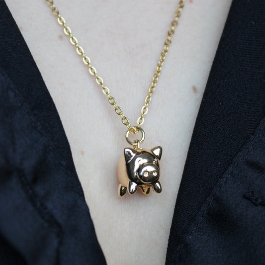 - Cerdito Chapa de Oro