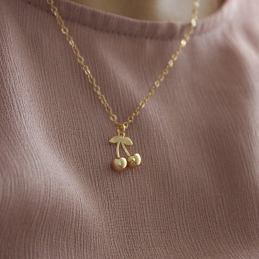 SHERRYL- COLLAR CEREZA CHAPA DE ORO