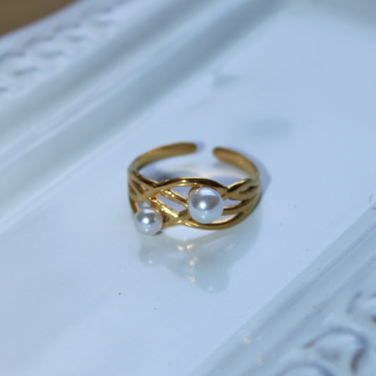 CLAIRE - ANILLO CRUZADO PERLAS ACERO INOXIDABLE