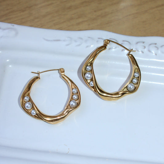 ARIANE - ARRACADA TORCIDA CON PERLA ACERO INOXIDABLE 30 MM